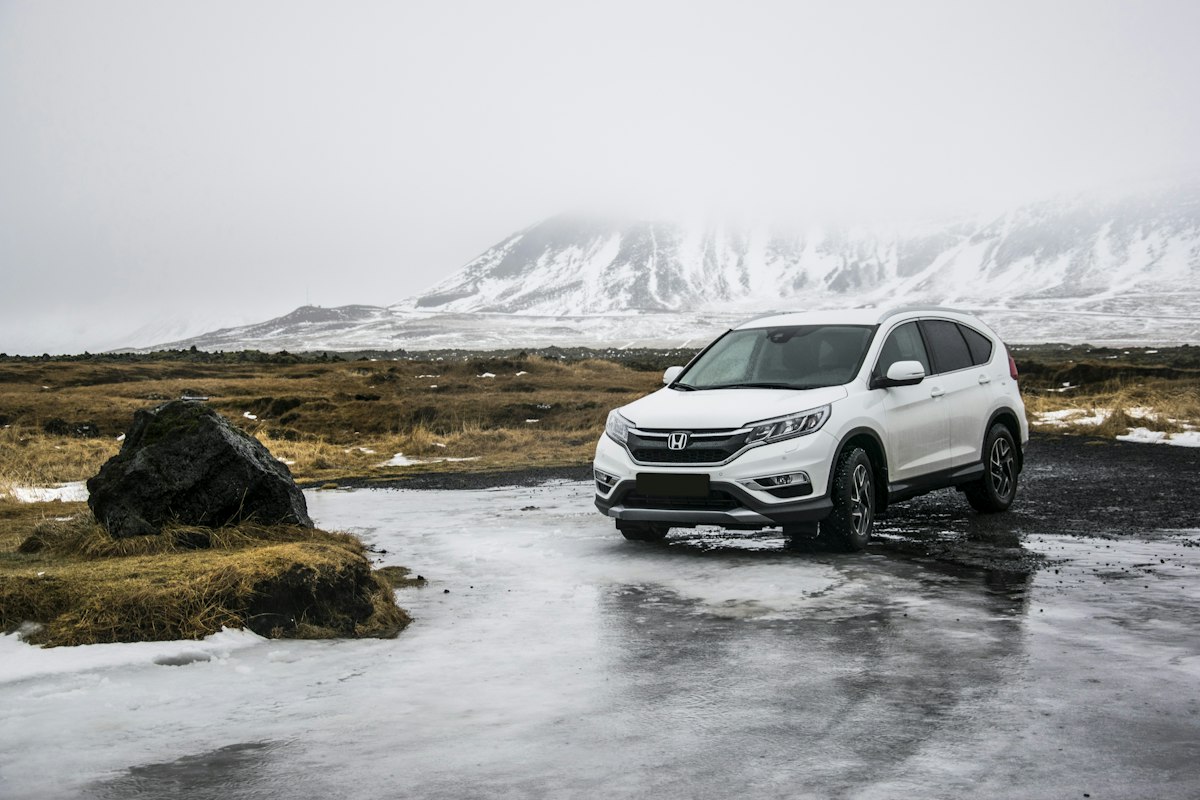 White SUV on a winter road